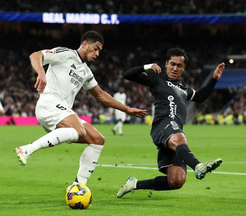 爱游戏体育链接-包含卫冕冠军皇家马德里豪取三分，保持领先的词条